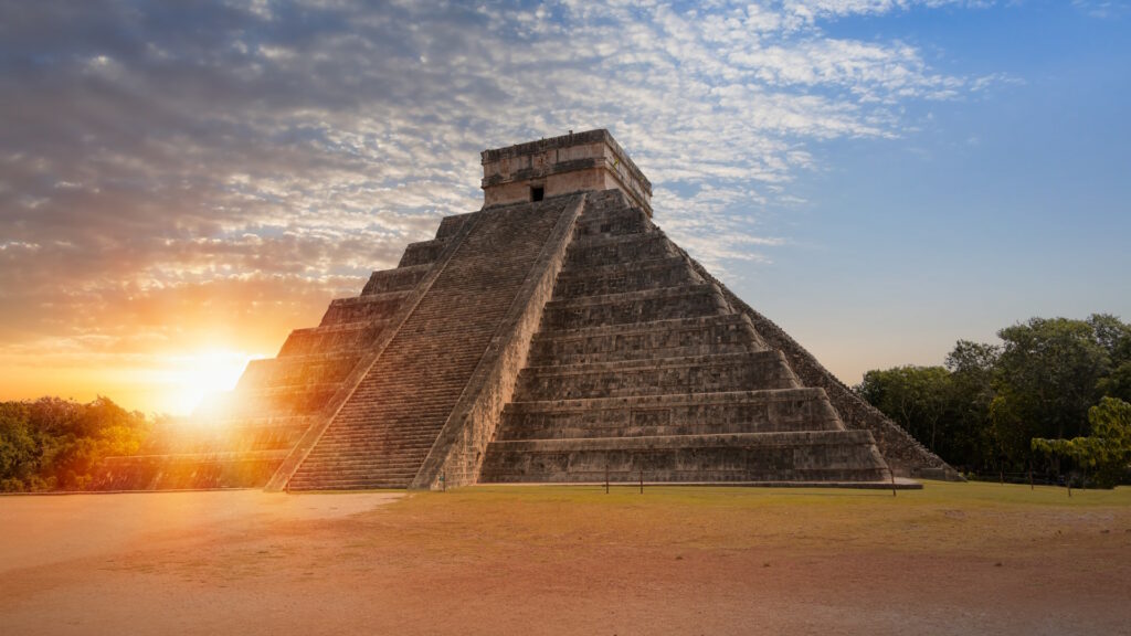 Kukulcan pyramid at sunset, in Chichen Itza, Mexico