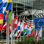 European flags in front of the European Commission in Brussels