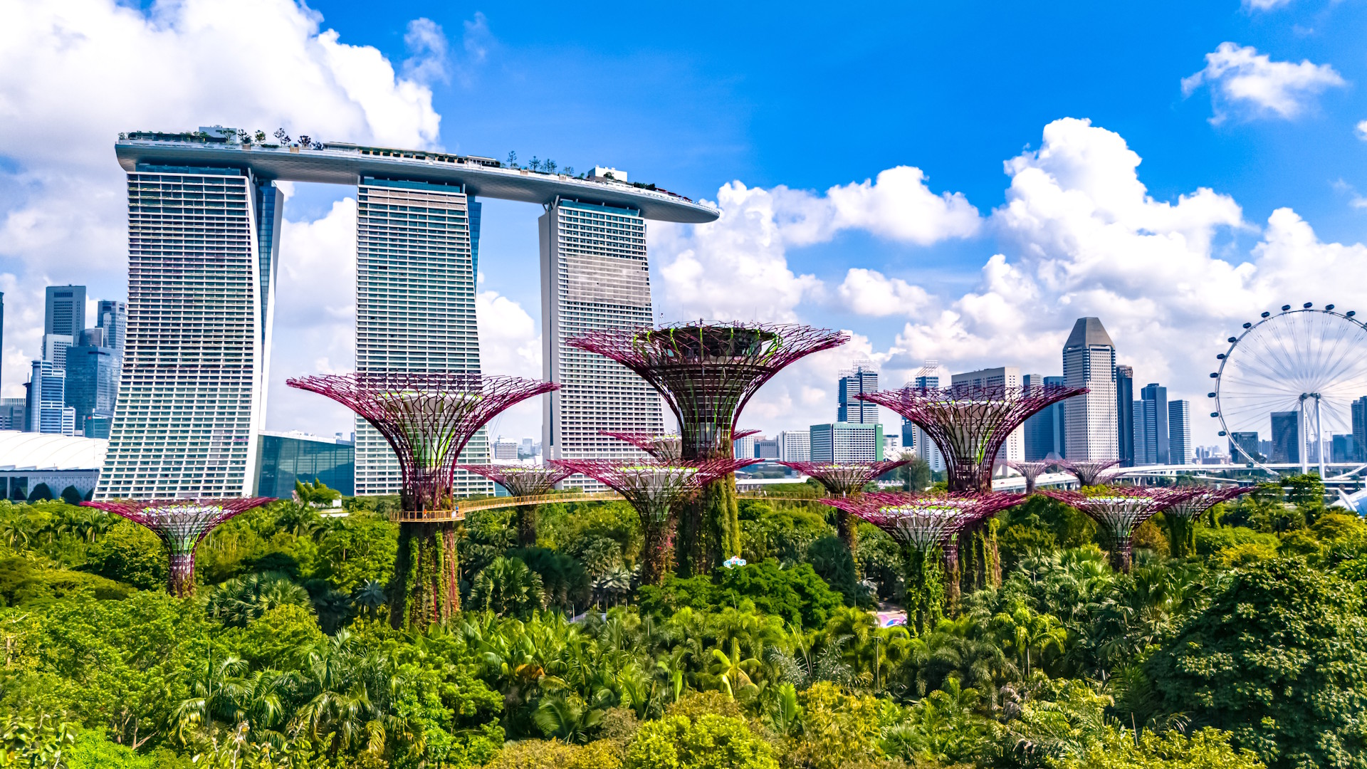 Aerial photo of Singapore's skyline including the Singapore Gardens and the Marina Bay Sands