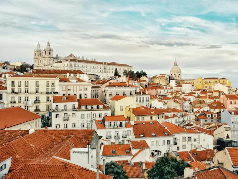 Photo of the roofs and the castle of Lisbon, capital of Portugal