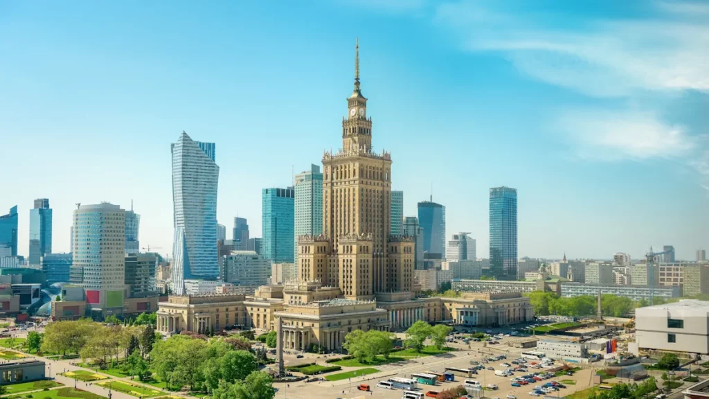 Aerial photo of the Palace of Culture and Science with the skyline of Warsaw, capital of Poland, in the background