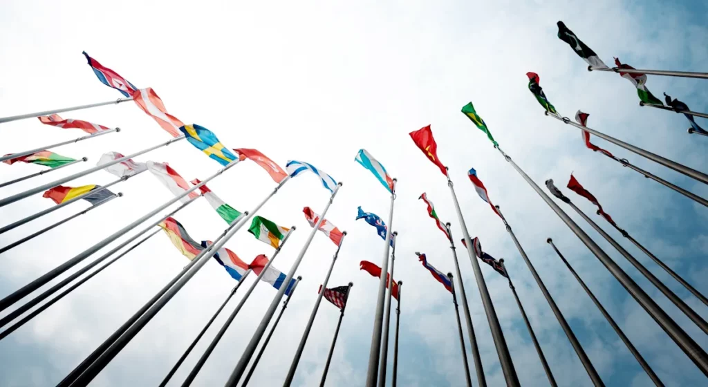 Set of flags from around the world waving in the wind