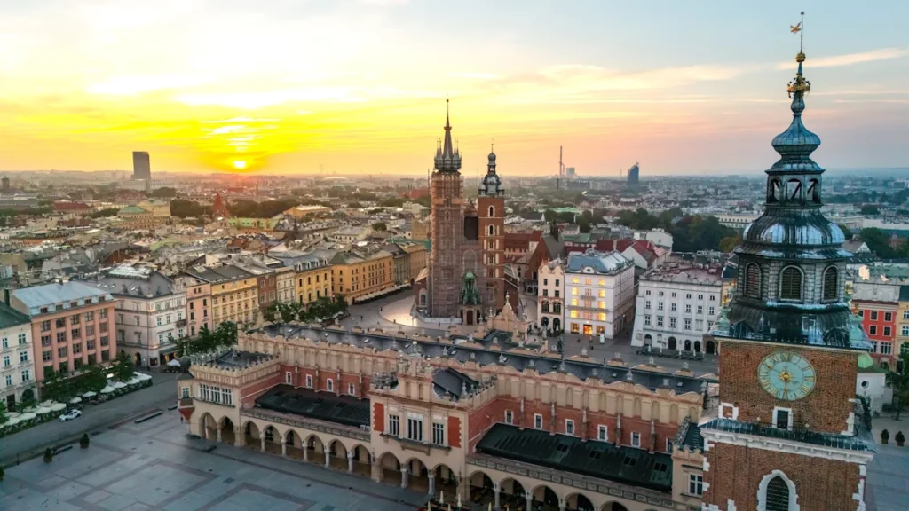 Main Market Square at summer dawn, aerial view of the historic central marketplace in Kraków, Poland