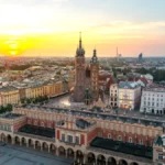 Main Market Square at summer dawn, aerial view of the historic central marketplace in Kraków, Poland