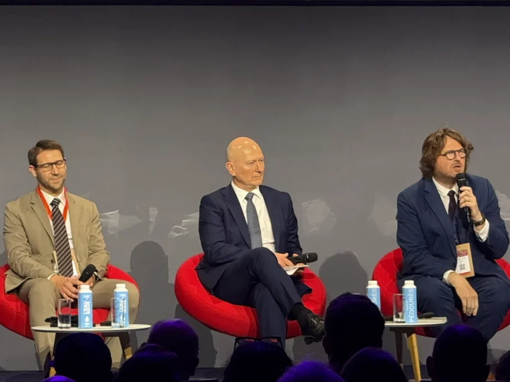 Jérôme Nicolas (AIFE), Stéphane Eustache (AIFE) and Sébastien Rabineau (DGFiP) speaking on main stage during JFE 2026 in Paris