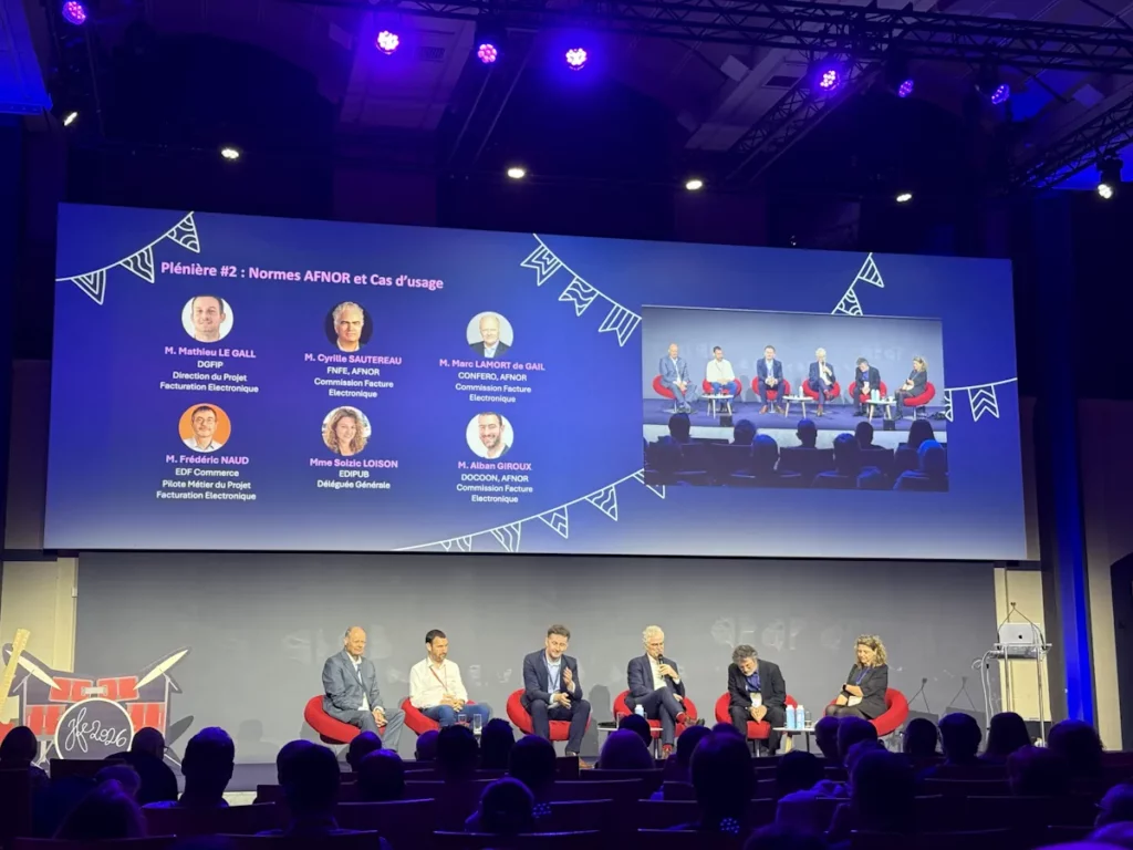Speakers in front of their audience during the second main conference on AFNOR standards & use cases at JFE 2026 in Paris
