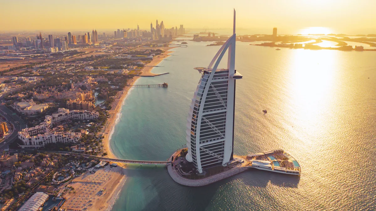 Aerial view of Burj Al Arab Jumeirah Island with downtown skyline in Dubai, United Arab Emirates