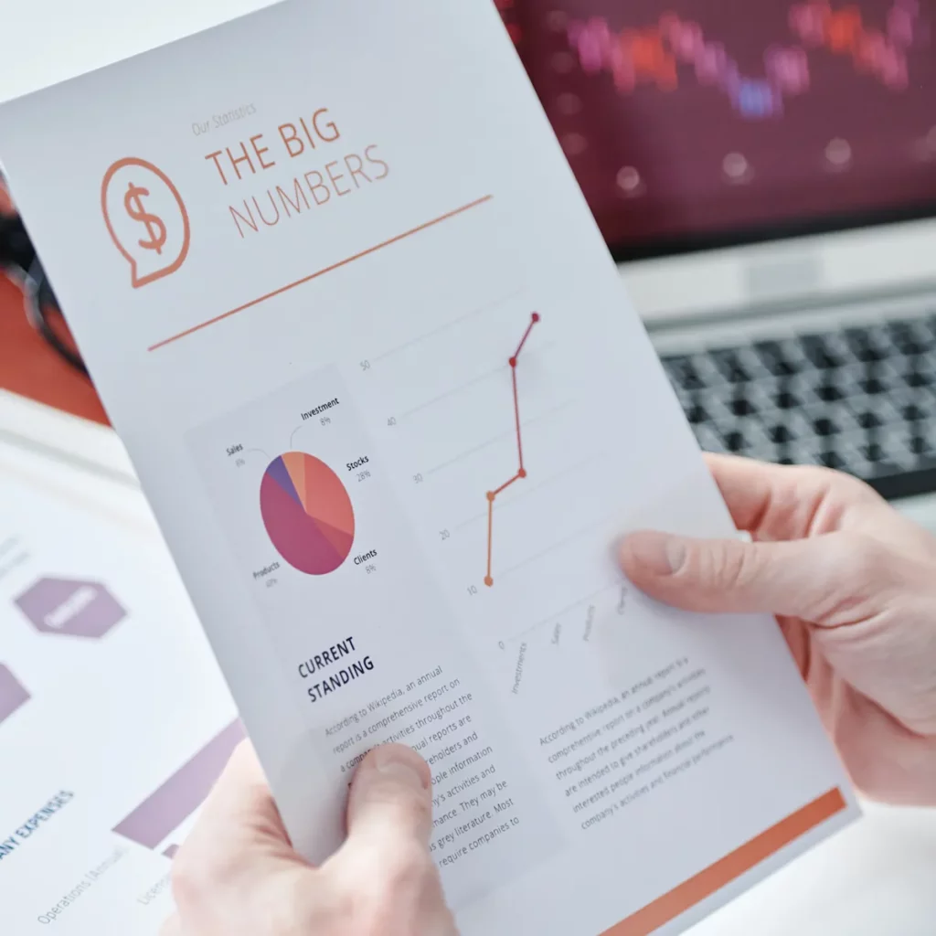 Close-up photo of a whitepaper held by an unknown person