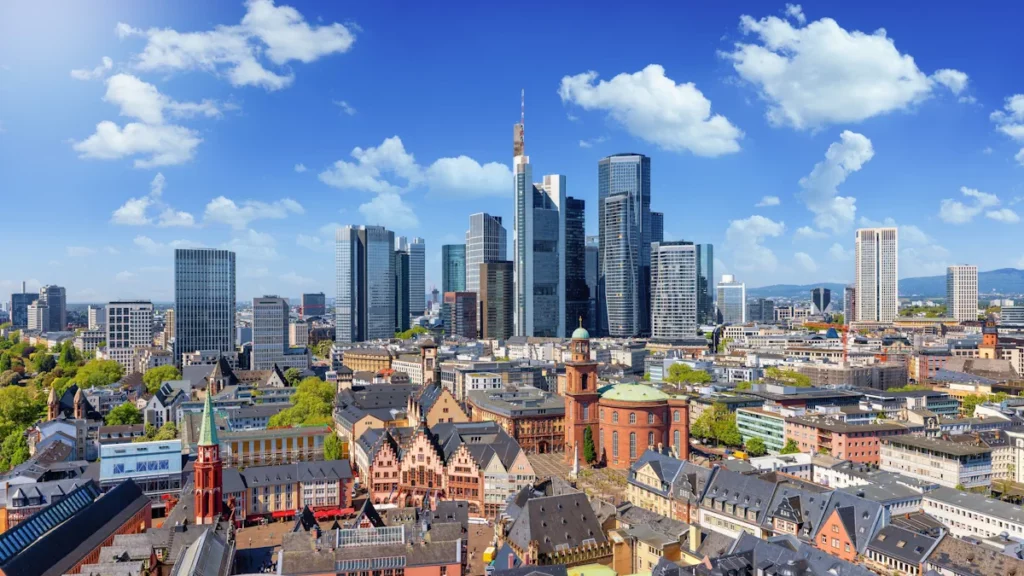 Elevated view of Frankfurt’s skyline, Germany, with the historic Römer district and modern office skyscrapers in the background.