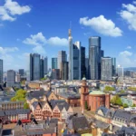 Elevated view of Frankfurt’s skyline, Germany, with the historic Römer district and modern office skyscrapers in the background.
