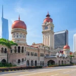 Panoramic view of the Sultan Abdul Samad Building and Jalan Raja in Kuala Lumpur, Malaysia, showcasing the city’s iconic urban landscape.