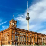 Rotes Rathaus, Berlin City Hall, with the TV Tower in the background, Germany.