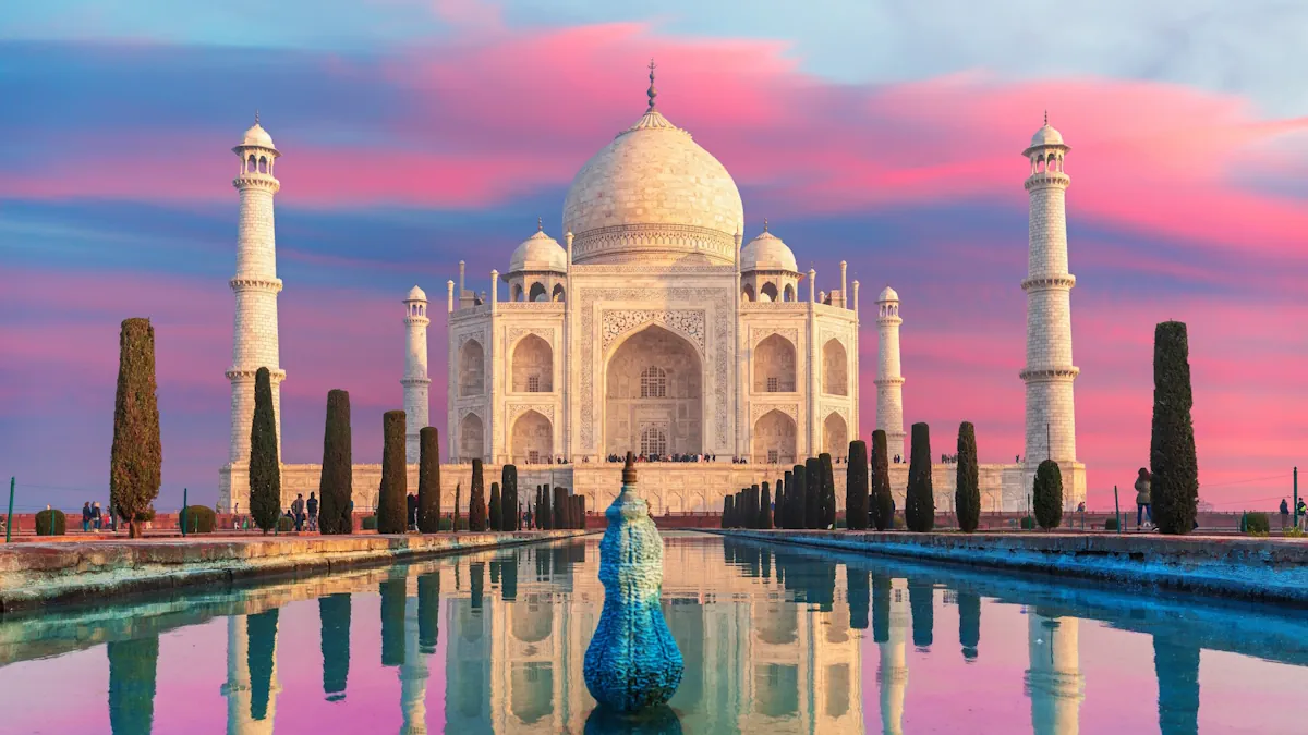 Photo of the Taj Mahal in India, over a pink sky