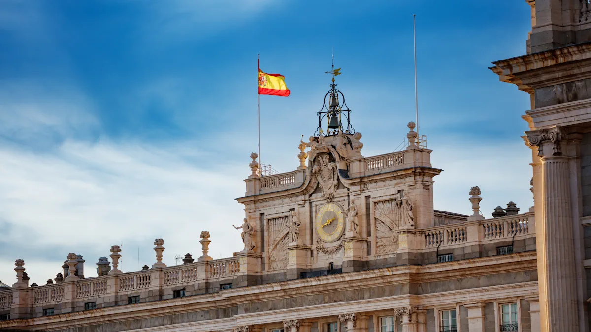 Spanish national flag flying above the Royal Palace of Madrid, Spain.